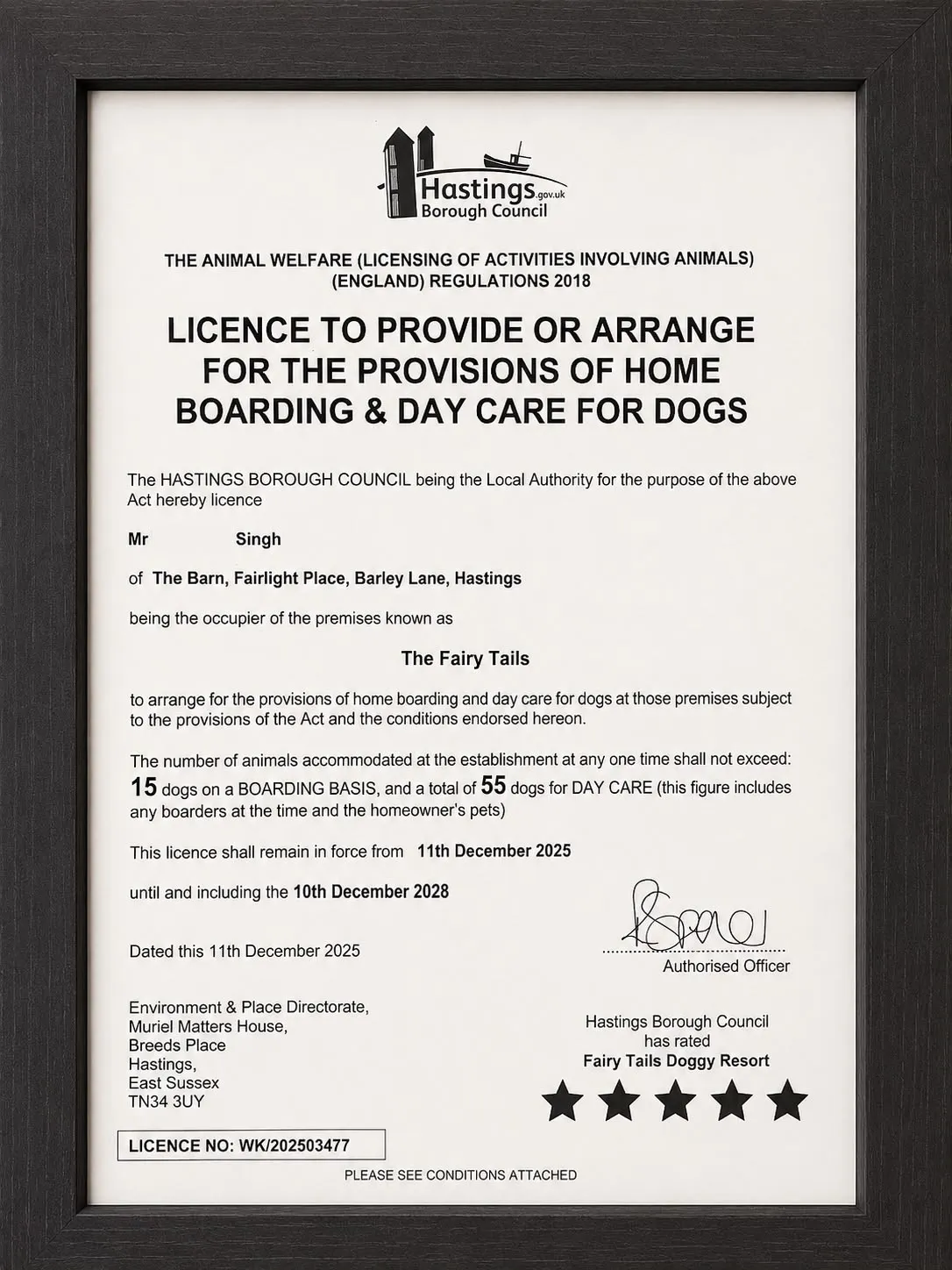 The Fairy Tails' framed licence from Hastings Borough Council: home boarding and day care for dogs, 5-star rated, licence number WK/202503477, valid 11 December 2025 to 10 December 2028